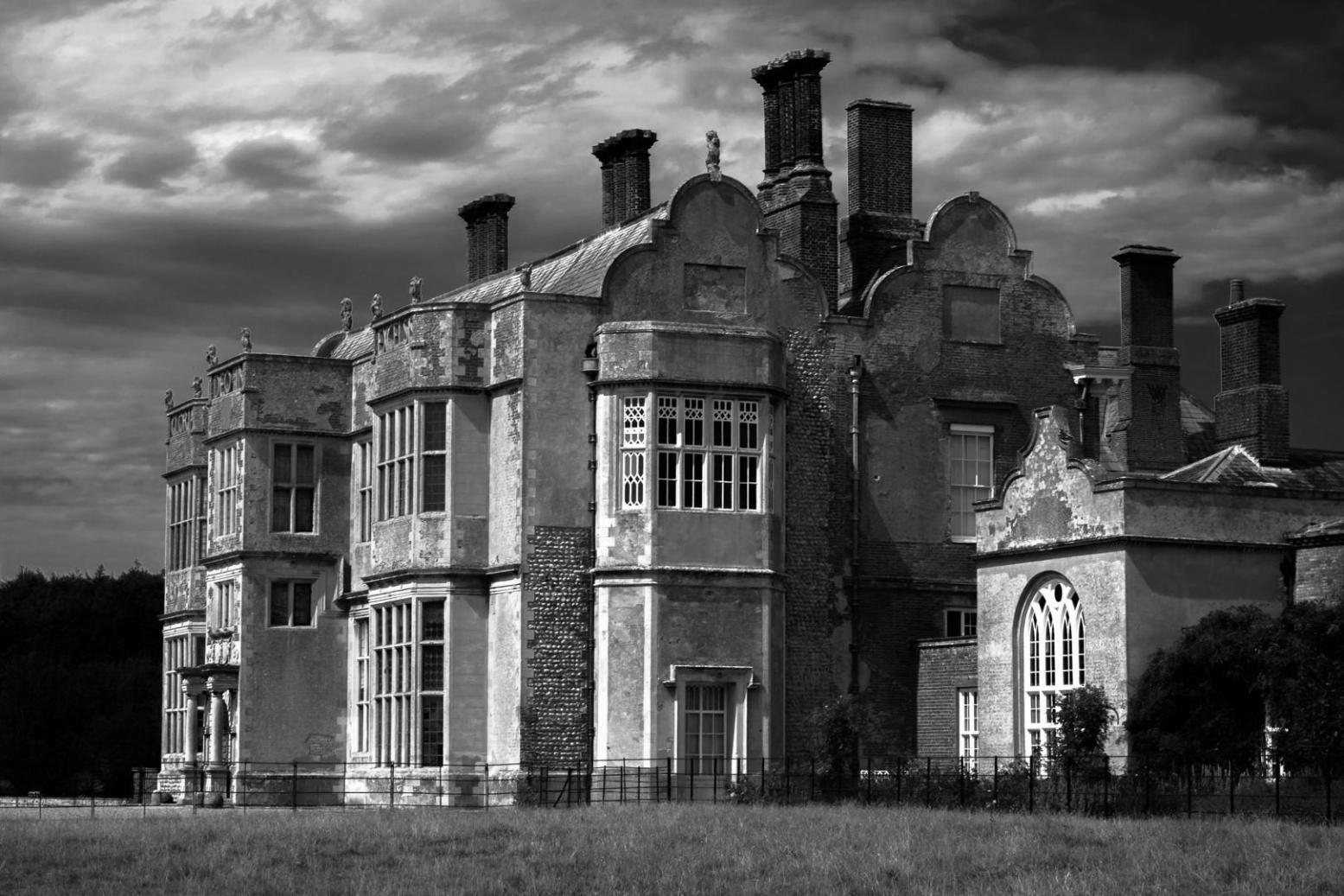 Professional workspace with strategic planning materials and negotiation frameworks displayed